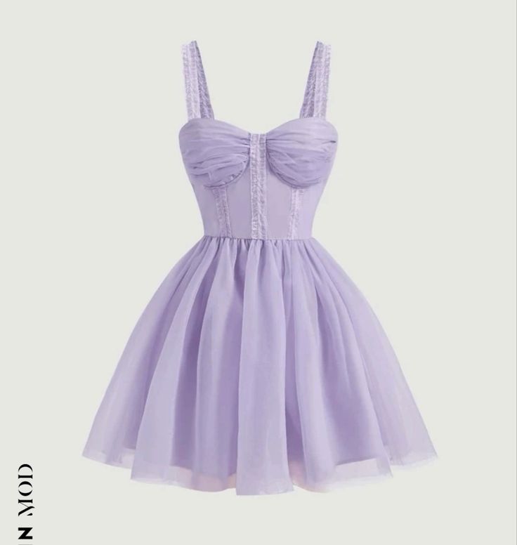 a dress that is purple and has a bow on the front, with an attached neckline