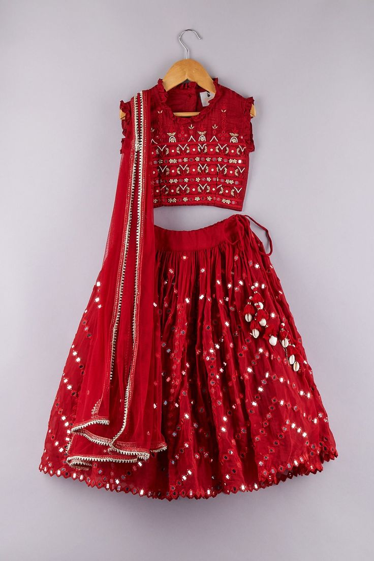 Maroon embroidered lehenga in thread and mirror work. Paired with an embroidered choli and dupatta.
Component: 3
Pattern: Embroidered
Type Of Work: Mirror work, Thread work
Neckline: Round
Sleeve Type: Sleeveless
Fabric: Banarasi
Color: Maroon
Other Details: 
Ruffle neckline
Embroidered hem dupatta
Occasion: Festive and Wedding - Aza Fashions Chaniya Choli For Kids, Sequin Lehenga, Lehenga Pattern, Mirror Work Lehenga, White Embroidered Blouse, Work Lehenga, Embroidered Hem, Kids Lehenga, Blouse Silk