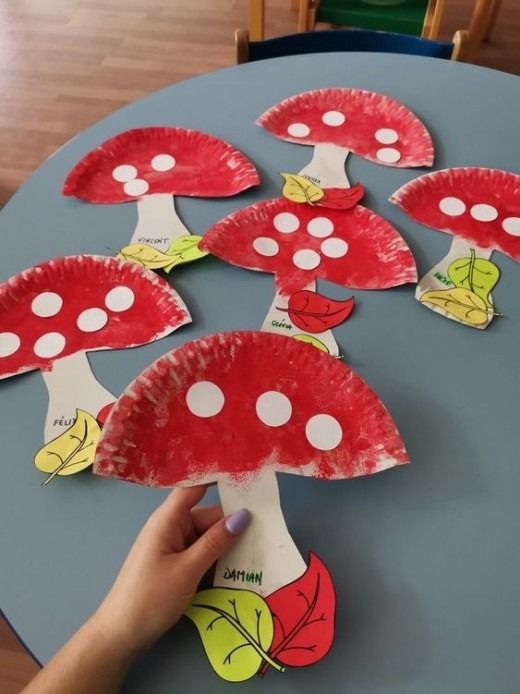 the paper plate mushroom craft is ready to be made with children's handprints