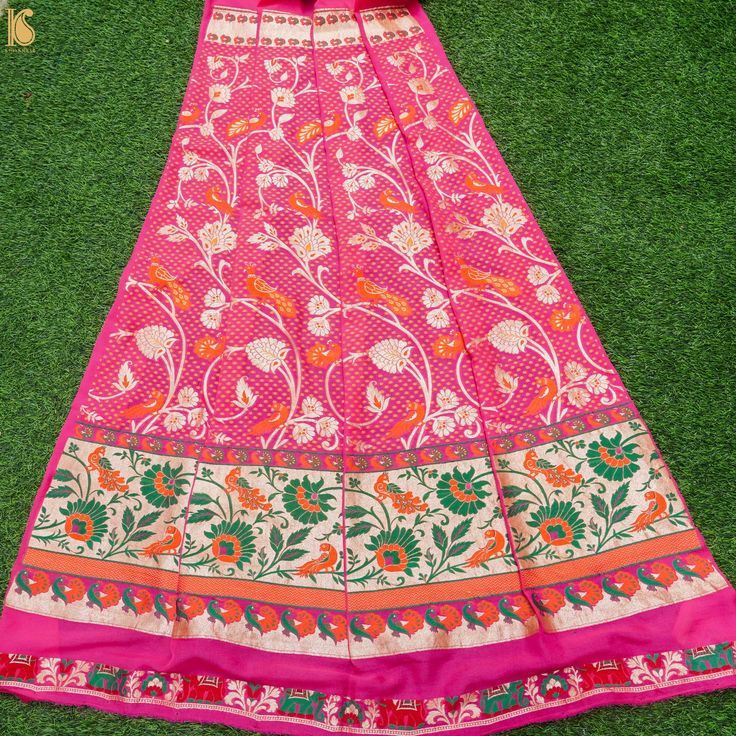 Experience the timeless elegance of our Handloom Banarasi Lehengas collection. Our Banarasi Georgette lehengas are light, flowy, and perfect for all seasons. This Handloom Banarasi Silk Lehenga in Pure Georgette fabric is adorned with meenakari weave and comes with 12 Kali Fabric for lehenga, blouse fabric, and dupatta border. Make a statement at your next event with this exquisite piece from Khinkhwab! Colors can be customized. Floor-length Motif Dupatta, Pink Unstitched Sharara With Motifs, Unstitched Pink Sharara With Motifs, Lehenga With Motifs For Navratri Ceremonies, Lehenga With Motifs For Navratri And Traditional Ceremonies, Pink Brocade Lehenga For Festive Occasions, Unstitched Navratri Lehenga With Motifs, Navratri Unstitched Lehenga With Motifs, Unstitched Lehenga With Motifs For Navratri