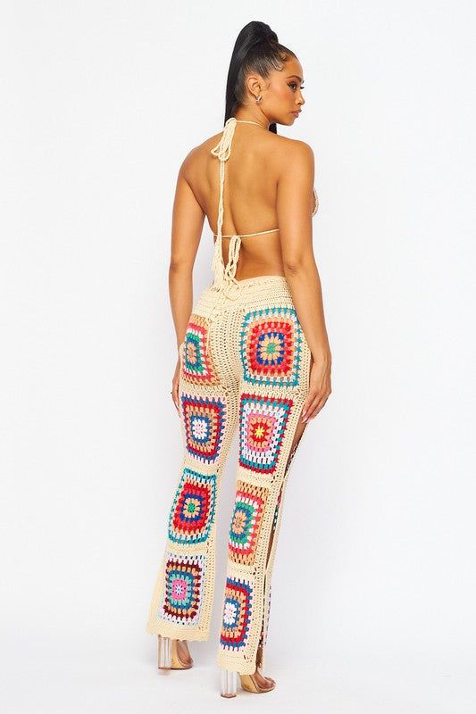 The Mali Crochet Pants Set is perfect for summer. It is crafted from high quality materials and features bright vibrant multi color crochet detailing. Perfect for vacations and summer concerts. 100% Acrylic