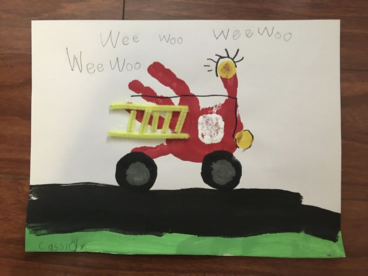 a child's handprinted card with a red tractor on the grass and words we were woo woo wee