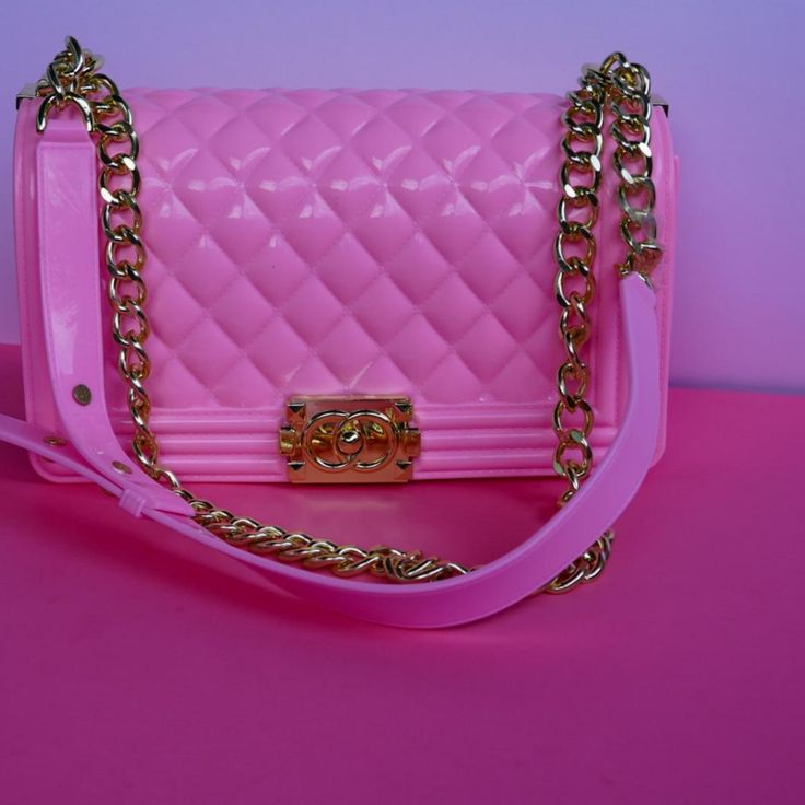 High Five Pin woman fashion PVC handbag with gold chain handle . pretty pink jelly bag Main material : PVC Shape : Square Closure Type:cover handle :single handle with gold chain Trendy Plastic Shoulder Bag For Party, Pink Bags With Gold-tone Hardware As A Gift, Pink Bags With Gold-tone Hardware, Pink Bag With Chain Strap, Pink Chain Strap Bag, Trendy Pink Bag With Gold-tone Hardware, Pink Bags With Chain Strap For Gifts, Pink Bags With Chain Strap As Gift, Pink Bag With Chain Strap As Gift