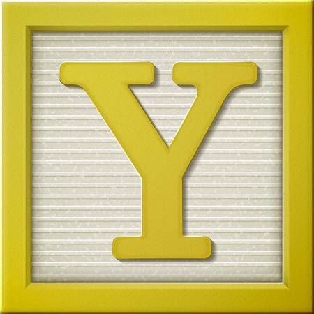 the letter y is cut out of foam and placed in a yellow frame with white stripes