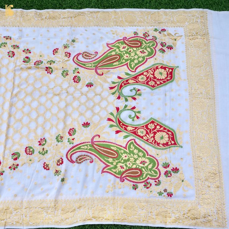 Fee --> Elevate your style with our Pure Georgette Silk Meenakari Banarasi Dupatta. This luxurious Banarasi dupatta showcases intricate Meenakari work, adding timeless charm and regality to your ensemble. Celebrate Banaras' artistry and heritage. Can be dyed in any color of your choice. Semi-stitched Jamawar Sets With Motifs, White Semi-stitched Jamawar Salwar Kameez, Semi-stitched White Jamawar Salwar Kameez, Multicolor Embroidered Pashmina Shawl With Zari Work, Festive White Resham Embroidered Pashmina Shawl, Traditional Jamawar Shawl With Chikankari Embroidery, Festive Multicolor Embroidered Pashmina Shawl In Traditional Drape, Festive White Pashmina Shawl With Resham Embroidery, White Jamawar Dupatta With Resham Embroidery