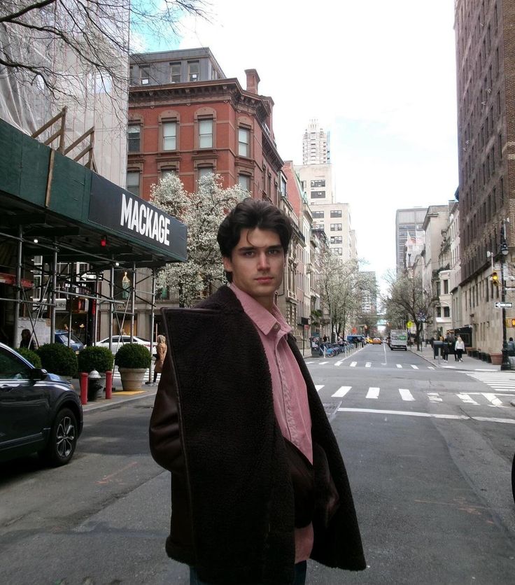 a man standing in the middle of an empty street