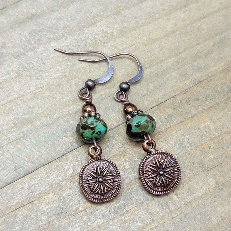 Rustic drops with a copper charm to add to your favorite outfit. Perfect for anyone who loves small, earthy, rustic jewelry. Antiqued copper plate charms Czech glass rondelles with picasso finish Copper accents Antiqued copper plate ear hooks Length is 1.75" Created in studio Diy Leather Earrings, Diy Jewelry Earrings, Rustic Earrings, Earrings Nature, Copper Plate, Copper Accents, Rustic Jewelry, Dangle Charms, Copper Earrings