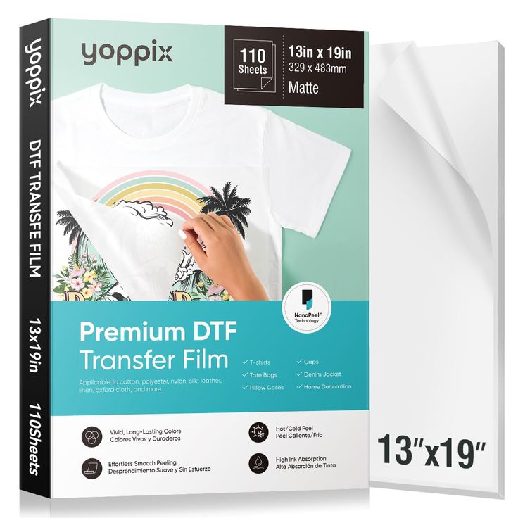 a white t - shirt with palm trees and rainbows on it is being printed