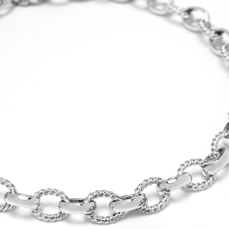 This unique cable link choker showcases an edgy, chunky style in stainless steel. Perfect as a solo statement piece or layered with multiple chunky chains for a bold, modern look. Lock and hardware in stainless steel. Preserve the elegance of your jewelry by avoiding direct contact with perfumes, body lotions, hairspray, and other chemicals. Always remove your jewelry before going to bed, bathing, showering, swimming, or engaging in physical activities like cleaning or gardening. Protect your pieces from extreme temperatures and humidity, and ensure they are not exposed to direct sunlight. After each use, clean your jewelry with a soft cloth and store it in an airtight jewelry box to maintain its luster and quality. Modern Silver Chunky Chain Necklace, Modern Metal Chain Necklace With Chunky Chain, Modern Stainless Steel Chain Choker Necklace, Modern Stainless Steel Choker Chain Necklace, Modern Stainless Steel Chain Choker, White Gold Metal Chain Necklace With Cable Chain, White Gold Metal Cable Chain Necklace, Modern Chunky Chain Stainless Steel Necklace, Modern Stainless Steel Necklace With Chunky Chain