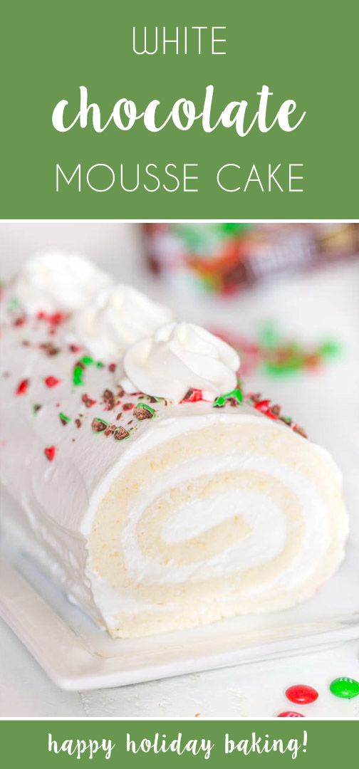 white chocolate mousse cake on a plate with the words happy holiday baking above it