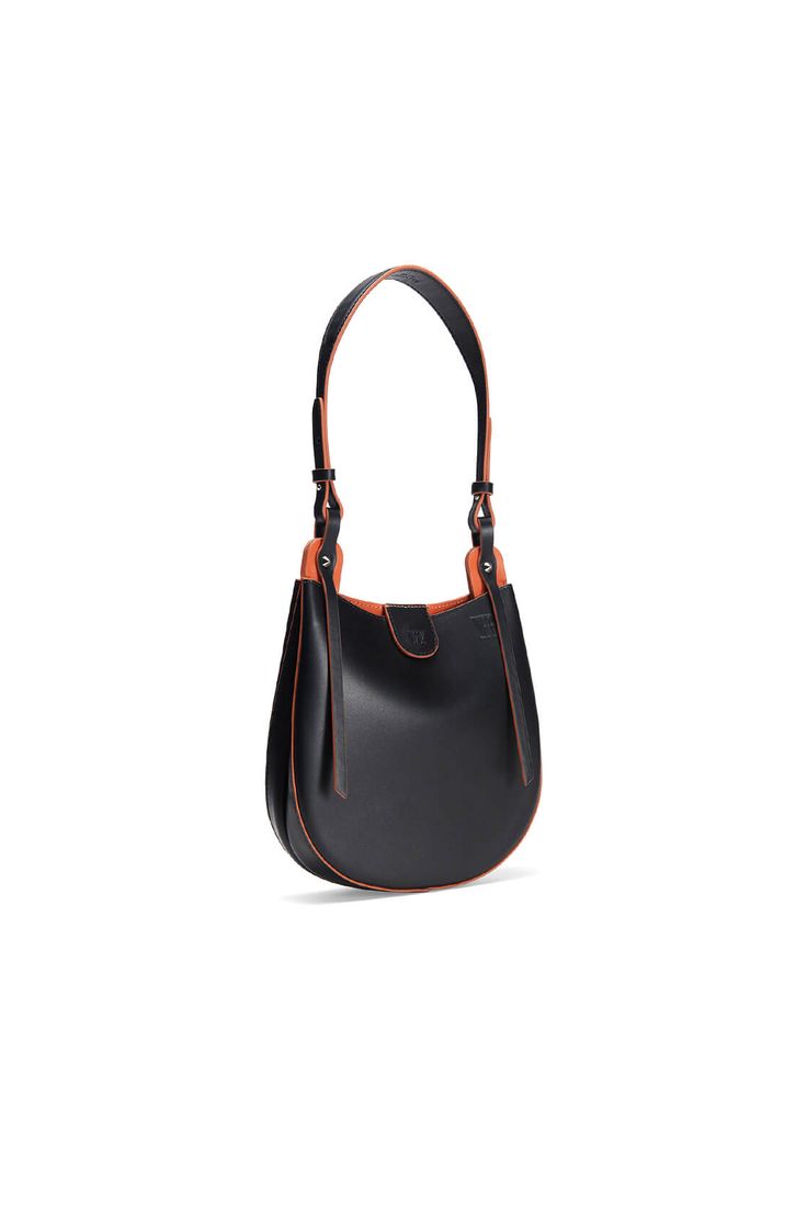 Matte black calfskin small saddle bag Amber contrast oil-edged and lining details Fold-over flap with magnetic closure Embossed logo Two leather straps of different lengths: a short one for side-shoulder, baguette-style carry and a long one for crossbody wear One bonus inner pouch, detachable with a chain -------------- Bag size: approximately 8” W x 7.5” H x 2.5” D (21 cm x 19 cm x 6 cm) One shorter adjustable leather strap drop: approximately 8.5" to 9.5" (22 cm to 24 cm) One longer adjustable Black Calf Leather Shoulder Bag With Magnetic Closure, Black Calf Leather Shoulder Bag With Leather Handles, Black Calf Leather Shoulder Bag With Detachable Strap, Black Calf Leather Shoulder Bag, Modern Black Leather Saddle Bag, Black Calf Leather Crossbody Shoulder Bag, Classic Black Saddle Bag With Gunmetal Hardware, Formal Leather Saddle Bag With Leather Trim, Elegant Leather Saddle Bag With Gunmetal Hardware