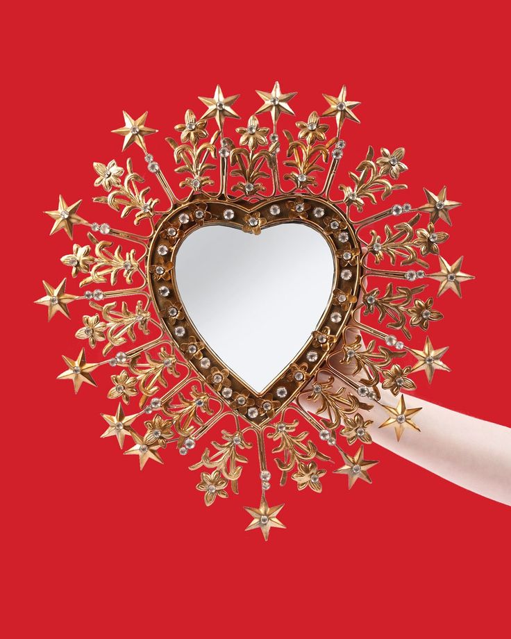 Inspired by the enchanting 'sacred heart'  this stunning mirror is shaped like a heart and surrounded by a burst of stars adorned with gems and crafted from a mix of embossed and intricately cut tinplate.  Hang individually, or mix with more pieces from our collection of milagros and ex-votos for a dazzling display! This piece has an aged gold finish, which is a beautiful balance between gold and silver Size 40 x 40 cm Mirror Hanging Ideas, Sacred Heart Art, Religious Artwork, Heart Mirror, Shaped Mirror, Stars Craft, Heart Decorations, Heart Art, Gold Mirror