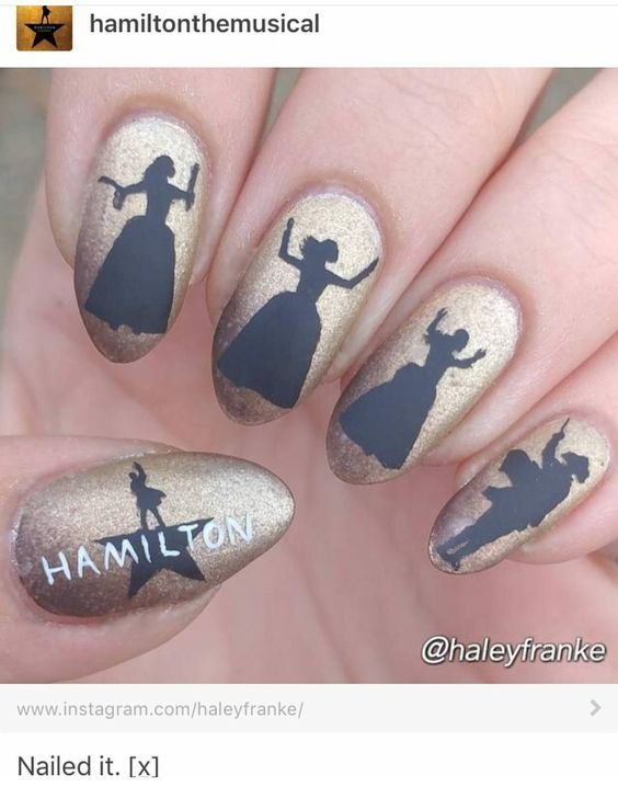 someone is holding up their nails with the silhouettes on them