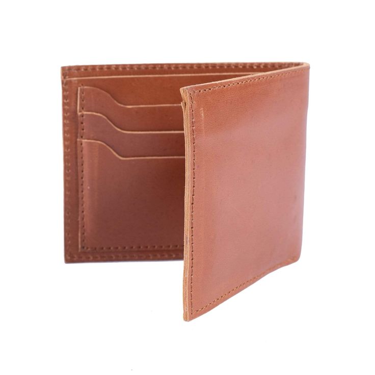 Our Ado billfold wallet is crafted with the highest quality leather and features 6 credit card slots to hold all your important cards as well as a billfold compartment to store your cash. Featuring a classic, timeless design this wallet makes the perfect gift. Features 4.5" length x 3.75" width x 0.75" height x 9" open 6 credit card slots High quality leather from environmentally conscious and sustainable sources. Lifetime guarantee Classic Wallets With Card Slots For Daily Use, Classic Trifold Wallet With Card Slots For Everyday, Bifold Wallets For Daily Use, Classic Bifold Card Holder For Daily Use, Classic Trifold Wallet With Card Slots, Classic Rectangular Trifold Wallet With Card Slots, Classic Bifold Card Holder With Card Slots, Classic Bifold Card Holder With Id Window, Classic Bifold Card Holder With Slots