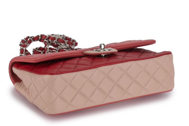 This Chanel medium classic single-flap bag is a tri-color bag in Pale Pink, Hot Pink and Red quilted lambskin leather with silvertone hardware and features, a front flap with signature CC turn-lock closure, and a half moon back pocket and an adjustable interwoven strap of Pink leather chain link shoulder/crossbody strap with silver crystal and faux pearl charms. Comes with an original dust cover and authenticity card.
First two numbers 19. Valentines For Singles, Pearl Charms, Silver Crystal, Pink And Red, Vintage Chanel, Dust Cover, Leather Chain, Flap Bag, Pink Leather