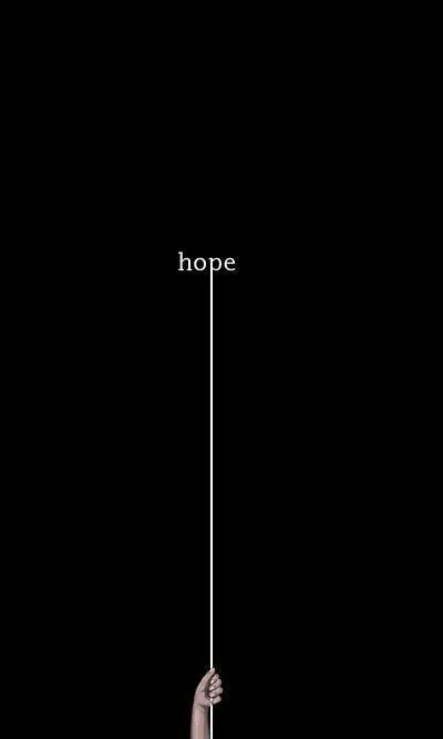 a person is holding on to a rope with the word hope above it in white