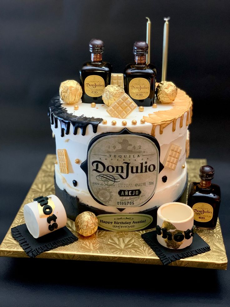 there is a cake that has some bottles on it