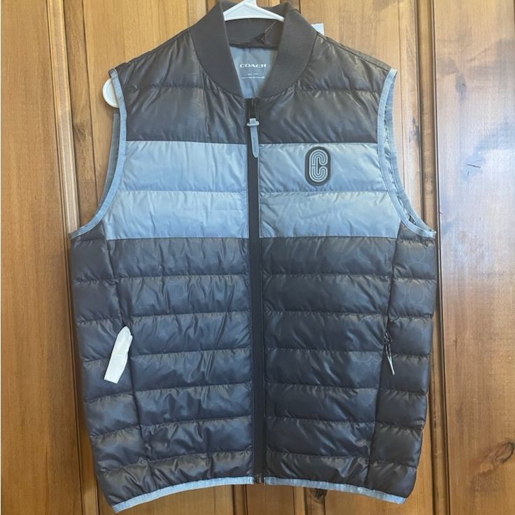 Nwt Coach Men’s Down Vest. Lightweight And Versatile. Two-Tone Blue Called India Blue Ink. Casual Coach Winter Outerwear, Sherling Vest, Mens Down Vest, Coach Men, Quilted Puffer Vest, Reversible Vest, Blue Camo, Black Vest, Mens Khakis