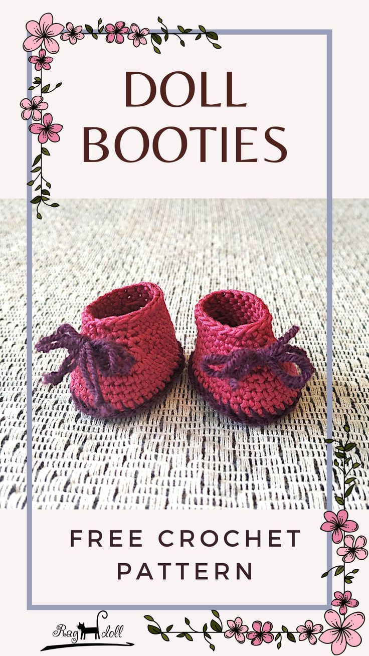 a pair of crocheted baby shoes sitting on top of a table