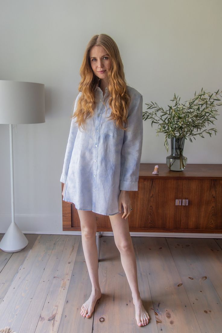 Your new go-to classic mini shirtdress. Highly versatile with a relaxed fit, this garment will become a staple in your closet year-round. Wear her as a classic shirtdress, a beach cover-up, or tie at the bottom to wear with jeans. This stunning blue tie-dye effect is created using the ancient art of shibori, using all-natural dyes applied by hand to the finest linen.  Available in two flexible sizes, for a relaxed and comfortable fit. XS/S fits sizes 0 to 6 (34 inches in total length) M/L fits s Summer Long Sleeve Chemise For Loungewear, Spring Relaxed Fit Shirt Dress For Daywear, Spring Daywear Dress With Shirttail Hem, Summer Mini Shirt Dress For Beach, Summer Mini Shirt Dress For The Beach, Long Sleeve Summer Chemise For Daywear, Blue Relaxed Fit Shirt Dress For Summer, Relaxed Fit Shirt Dress With Spread Collar, Relaxed Fit Shirt Dress With Spread Collar For Daywear