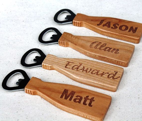 four personalized wooden bottle openers with black handles