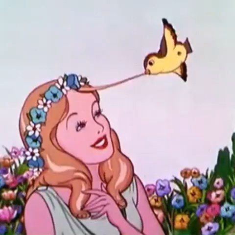 a woman with long red hair is looking at a yellow bird on her nose, while she's holding the tail of a flower in front of her mouth