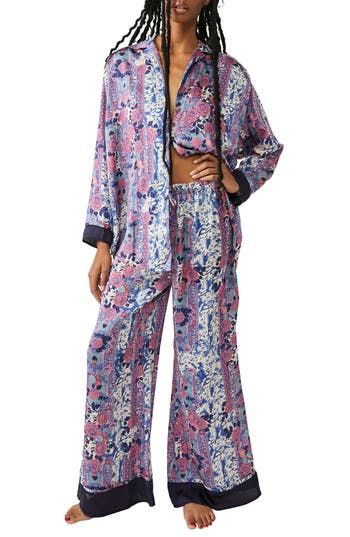 Make bedtime a bit more boho in flowery pajamas that live up to their dreamy designation. 28 1/2" to 31" top length; 28" inseam; 32" leg opening; 14" front rise; 17" back rise (size Medium) Top has spread collar; long sleeves 100% polyester Hand wash, line dry Imported Spring Printed Sleepwear For Pajama Party, Printed Sleepwear For Spring Pajama Party, Printed Sleepwear For Pajama Party In Spring, Printed Sleepwear For Spring Loungewear, Spring Sleepwear Sets With Relaxed Fit, Spring Sleepwear Sets In Relaxed Fit, Long Sleeve Summer Sleepwear For Bedtime, Spring Season Relaxed Fit Sleep Sets, Spring Matching Set Sleepwear