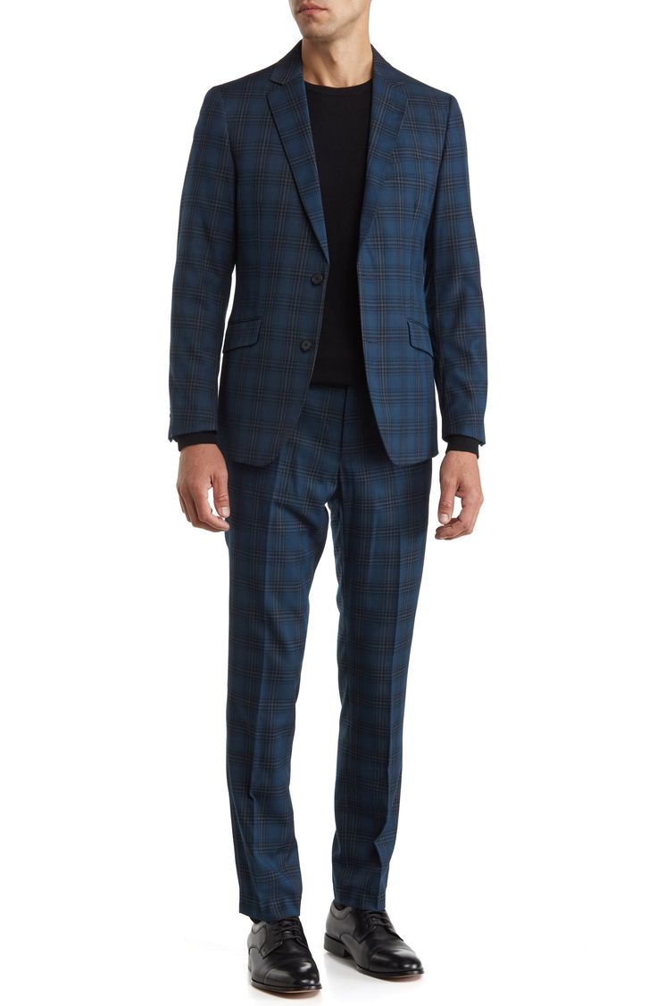 Whether it's an office occasion or a special event, this dapper suit with a classic plaid design can do it all. Jacket is lined; trousers are lined to the knee 81% polyester, 19% rayon Dry clean Imported Model stats: 6'1" height, 32" waist. Model is wearing size 40. Plaid Single Breasted Suits For Business Casual, Plaid Suits For Semi-formal Occasions, Semi-formal Plaid Suit, Plaid Semi-formal Suit, Business Plaid Suit With Suit Collar, Plaid Business Suit With Suit Collar, Fitted Plaid Suit With Welt Pockets, Tailored Plaid Suits For Business Casual, Plaid Notch Lapel Suit For Business Casual