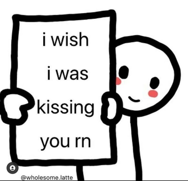 a cartoon character holding a sign that says i wish i was kissing you're