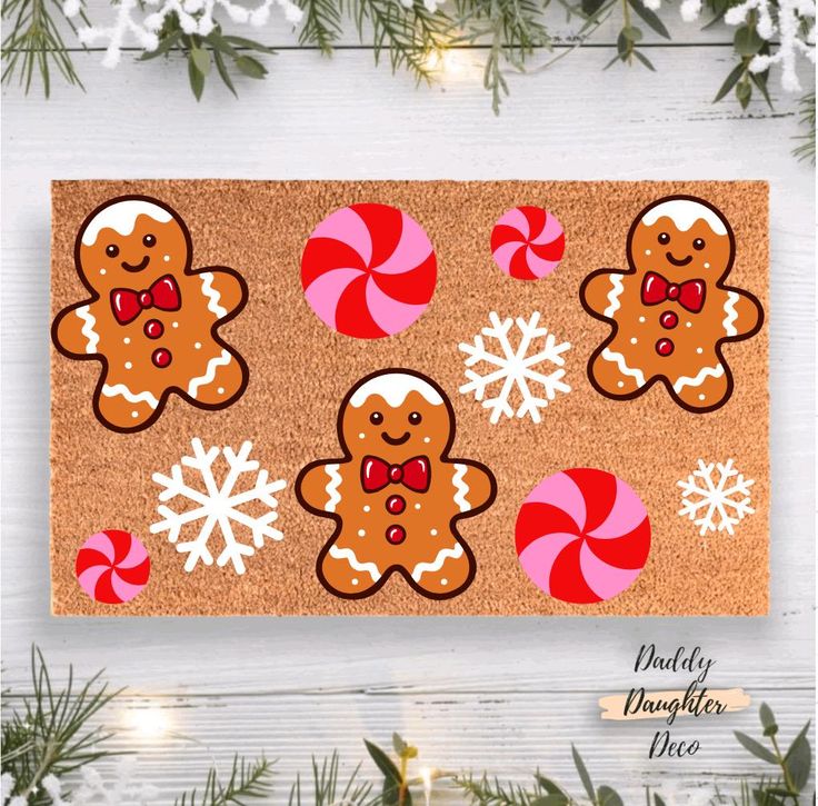 a door mat decorated with gingerbreads and candy canes