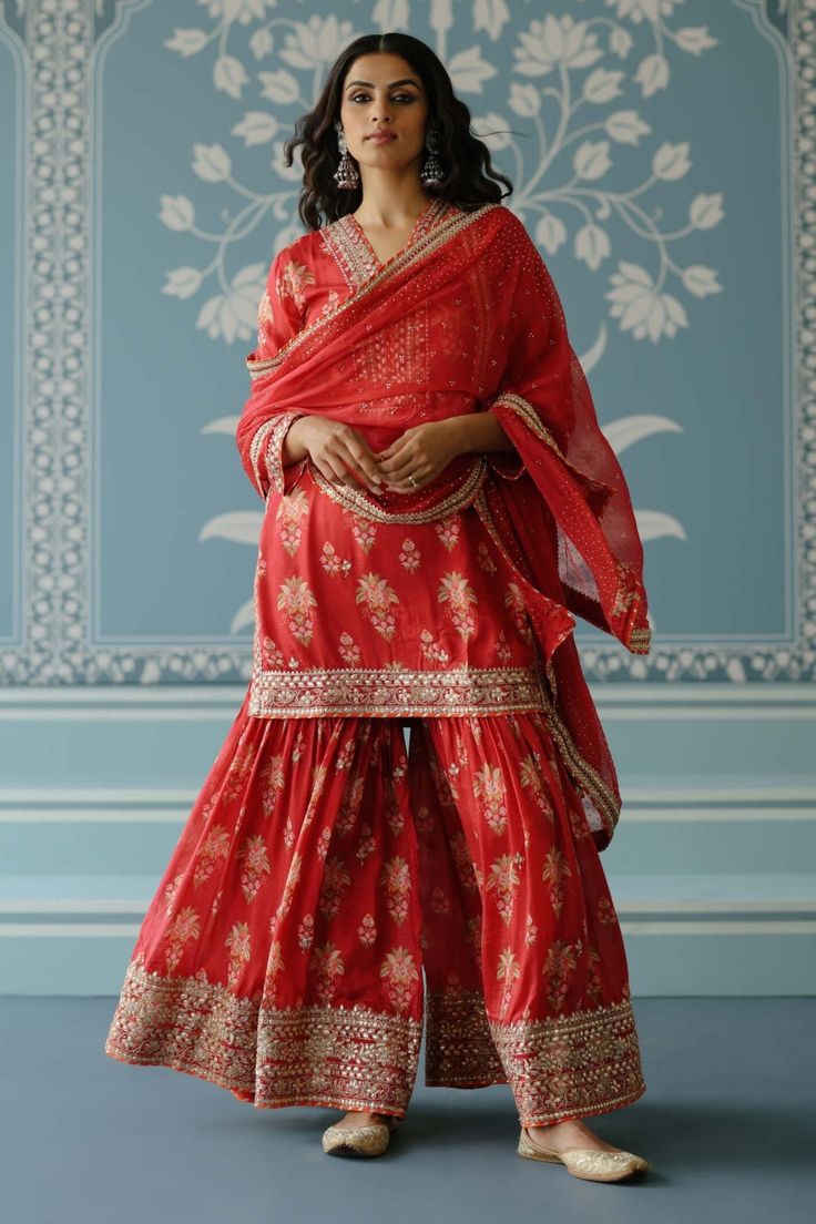 Sadhna Red Sharara Set by Gopi Vaid, available on Indiaspopup.com Red Embroidered Sharara For Transitional Season, Red Embroidered Chinon Sharara, Red Embroidered Bohemian Sharara, Bunai Design, Transitional Red Sharara With Motifs, Red Sharara With Embroidered Border, Red Sharara, Indian Arts And Crafts, Short Tunic