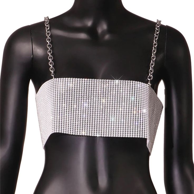 Our EUPHORIA top is a see through top made of rhinestone fishnet fabric. SIZE Bust Waist 26.77-37.40 4.72 Evening Rhinestone Crop Top For Summer, Summer Evening Crop Top With Rhinestones, Summer Night Out Tops With Bling, Crystal Embellished Tops For Night Out In Summer, Summer Evening Rhinestone Crop Top, Summer Evening Rhinestones Crop Top, Silver Rhinestone Tops For Summer, Spring Glamorous Mesh Top With Rhinestones, Evening Mesh Top With Rhinestones