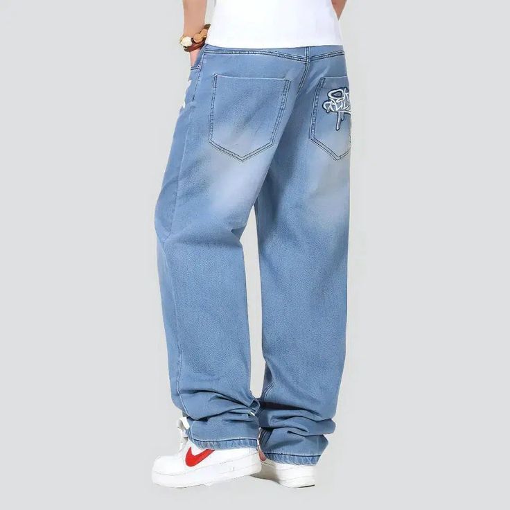 Introducing our must-have baggy men's inscribed jeans from the 2023 Summer Collection an embodiment of edgy style with a fashion twist!Why These Jeans Are a Must-HaveCrafted with precision, these jeans embody the perfect blend of laid-back mode and comfort. The baggy fit, painted details, and high-waist design give these jeans a unique edge, making them a staple piece for any vogue-forward wardrobe.Distinctive Features: Baggy Fit: These jeans are designed with a simple and informal fit, giving y Jeans Street Style, Edgy Style, Light Blue Color, Staple Pieces, Baggy Fits, Casual Fits, Edgy Fashion, Urban Fashion, Jeans Style