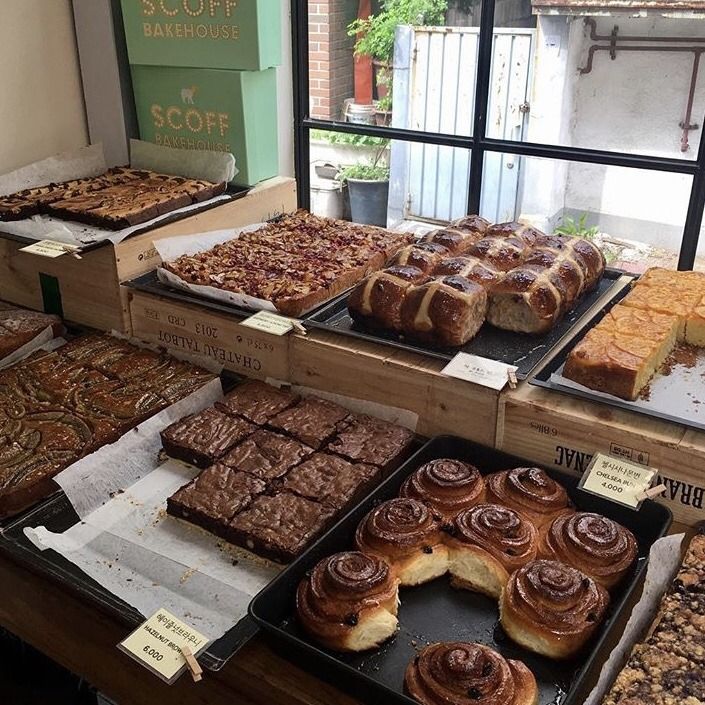 many different types of pastries are on display