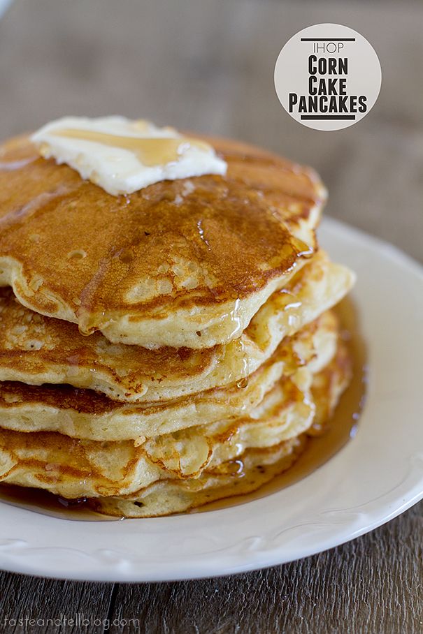 a stack of pancakes covered in butter and syrup