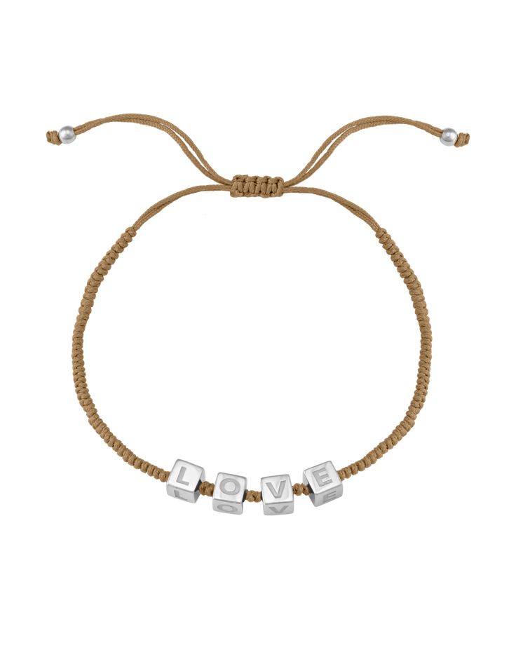 The epitome of laid back sophistication wrapped around your wrist, the Alpha Block Bracelet is going to become your go to bracelet for every wrist stack. Handcrafted and strung together with 18k gold vermeil, 18 rose gold vermeil or 925 Sterling Silver alphabet block beads nestled in the center, you can choose up to 8 letters to reflect the people who are most special to you. The uncomplicated design can be worn solo, or would look great stacked, or mixed and matched with your other favorite Mag Adjustable Stackable Wrap Bracelet Gift, Spiritual Sliding Knot Bracelet For Everyday, Adjustable Gold Sterling Silver Beaded Bracelets, Adjustable Gold Beaded Sterling Silver Bracelet, Everyday Jewelry Bracelet With Adjustable Cord, Everyday Adjustable Cord Bracelet Jewelry, Everyday Adjustable Cord Bracelet, Adjustable Hand-strung Everyday Bracelets, Sterling Silver Bracelets With Sliding Knot For Friendship