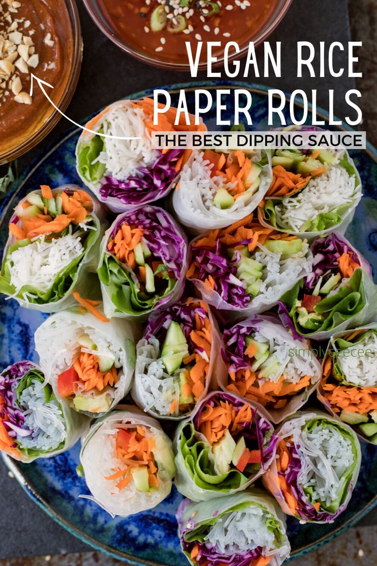 vegan rice paper rolls on a plate with dipping sauces in the back ground