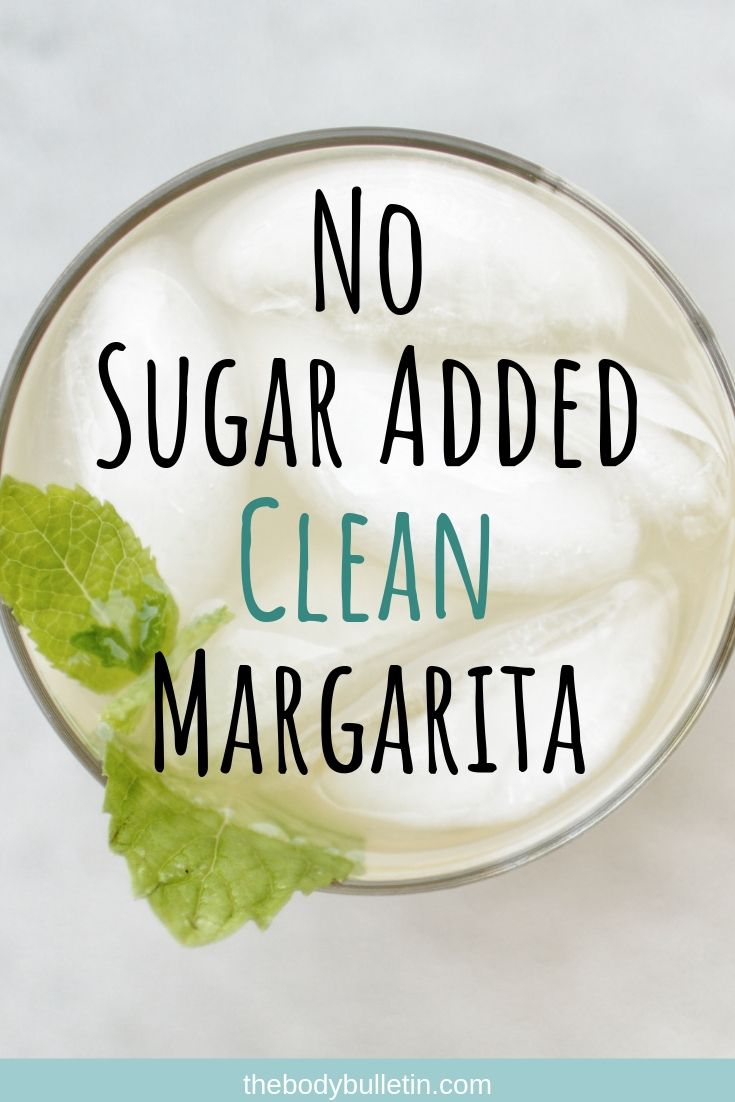 no sugar added clean margarita in a glass with mint leaves on the rim and text overlay that reads, no sugar added clean margarita