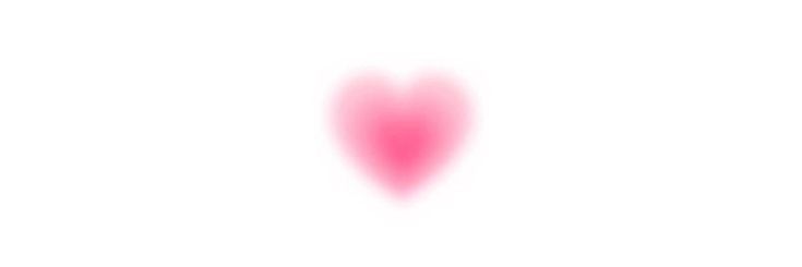 a blurry image of a pink heart on a white background