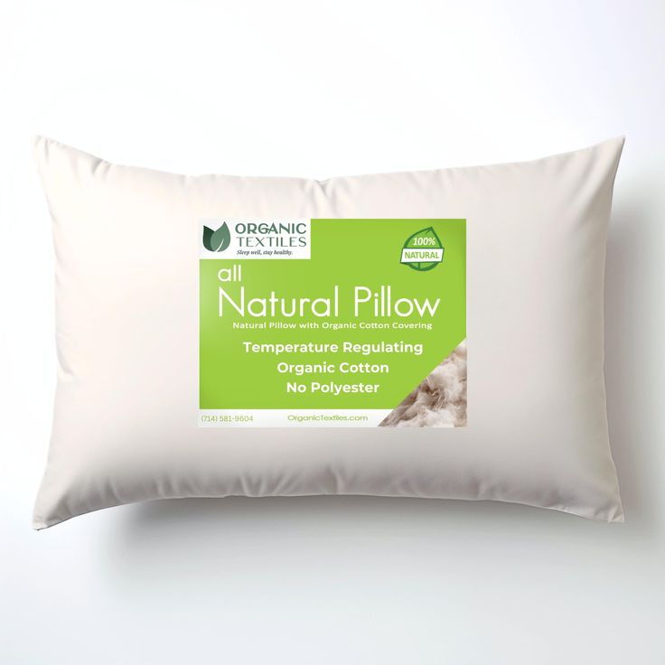 a pillow that is sitting on top of a white surface with an organic product label