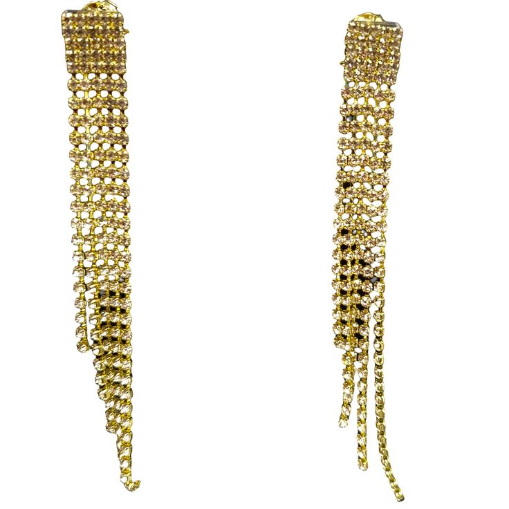 Handmade in Brazil. These glittering strands of CZ's will add a gorgeous sparkle to any outfit. Dressed up or down they will light up any look! Overall Length: 4" Width: 1/2" Our metal is 18K gold plated over 100% nickel free brass and silver plated over 100% nickel free brass. To keep fashion jewelry looking brand new, through almost any wear and tear:Dip piece(s) in liquid jewelry cleaner, rinse with water, and pat dry!All are safe to be dipped in Sterling Silver cleaner. BRT13 *C-3* Glamorous Gold Plated Crystal Earrings For Party, Glamorous Yellow Gold Earrings For Party, Glamorous Gold Plated Earrings For Parties, Glamorous Long Drop Sparkling Jewelry, Gold Rhinestone Jewelry For Parties, Glamorous Gold Evening Earrings, Party Jewelry With Rhinestones In Long Drop Shape, Party Jewelry With Long Drop Rhinestones, Long Drop Crystal Earrings With Sparkling Stones For Party