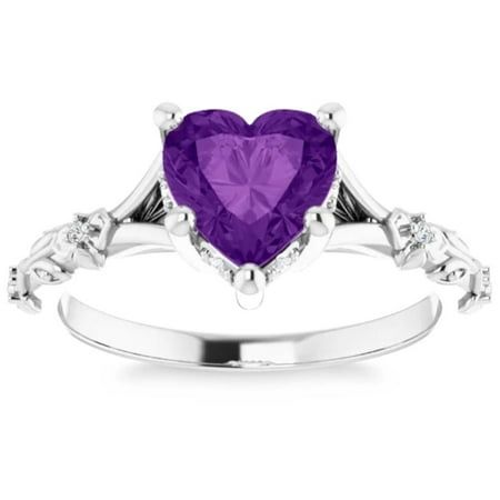 a heart shaped amethorate and diamond ring