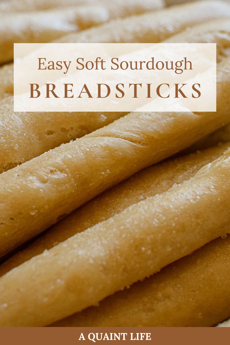 bread sticks stacked on top of each other with the words easy soft sourdough bread sticks