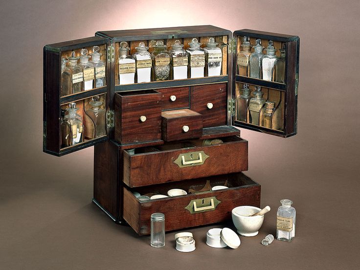 an assortment of spices and condiments are arranged in the shape of a chest