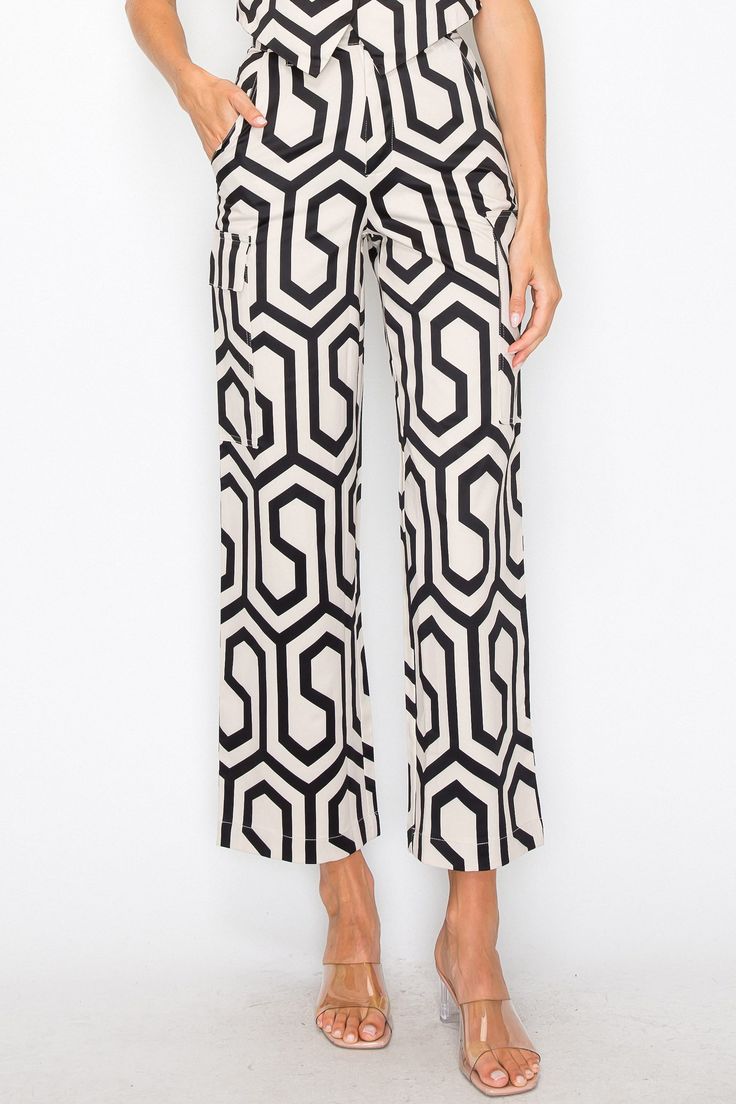 • SKU: P2126• S-M-L• Hand wash only• Feature a stylish and eye-catching geometric print that adds a touch of modernity to your outfit.• These pants come with both side pockets and flap pockets, providing ample space to keep your essentials handy.• The belt loop design allows you to accessorize with your favorite belts, enhancing the pants' overall chic look. Spring Abstract Print Wide Leg Bottoms, Chic Wide Leg Bottoms With Bold Print, Summer Wide Leg Bottoms With Abstract Print, Wide Leg Bottoms With Abstract Print For Summer, Chic Abstract Print Pants For Spring, Casual Bottoms With Bold Print For Spring, Chic Printed Cotton Pants, Summer Wide Leg Bottoms With Bold Print, Casual Summer Pants With Bold Print