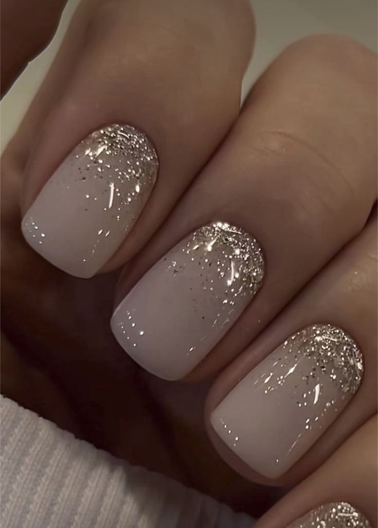 Cream And Gold Glitter Nails, Champagne Nails With Glitter, Champagne Colored Dip Nails, Neutral Nails With Silver Glitter, Bridesmaid Nails With Gold, White Nails With Gold Sparkles, White Silver Gold Nails, Near Years Nails, Nails Sparkly Tips