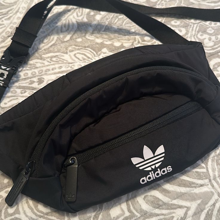 Practically Brand New. Trendy Adidas Shoulder Bag With Adjustable Strap, Everyday Black Pouch Belt Bag, Black Pouch Belt Bag For Everyday, Trendy Adidas Black Bag, Trendy Black Adidas Bag, Functional Adidas Black Bag, Casual Adidas Shoulder Bag For Travel, Functional Black Adidas Bag, Trendy Black Belt Bag For Everyday