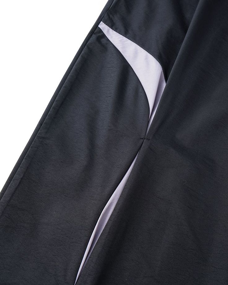 Details: Long parachute pants with stripes designBottom Length: LongMaterials:95% Polyester + 5% Spandex Black Pants With Contrast Stripes For Streetwear, Black Trousers With Contrast Stripes, Black Athleisure Bottoms With Contrast Stripes, Black Nylon Wide Leg Parachute Pants, Black Nylon Sweatpants With Side Pockets, Stretch Black Pants With Contrast Stripes, Black Wide Leg Nylon Parachute Pants, Black Stretch Pants With Contrast Stripes, Black Straight Pants With Elastic Side Panels