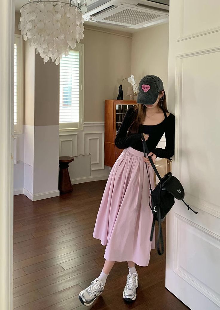 The perfect pink midi skirt for spring! With a pleated flare silhouette, side pockets and concealed back zipper, this skirt mixes and matches easily, and looks cute all day. Lined. S: 25" waist, 29.5" lengthM: 26.5" waist, 29.5" lengthL: 28" waist, 30" lengthXL: 29.5" waist, 30" length Trendy Pink Skirt With Pockets, Pink Pleated Full Maxi Skirt, Chic Pleated Skirt With Pockets For Spring, Feminine Full Skirt With Pleated Hem, Feminine Relaxed Pleated Skirt, Feminine Knee-length Pleated Skirt, Pink Midi Pleated Skirt, Pink Pleated Midi Skirt For Spring, Pink Midi Pleated Skirt For Spring