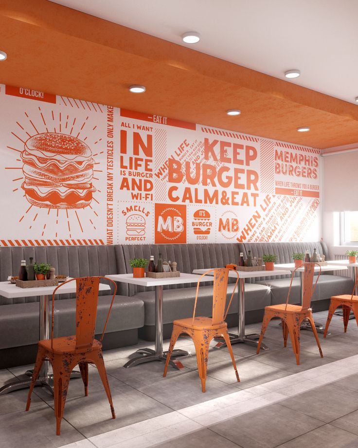 the restaurant is decorated in orange and white